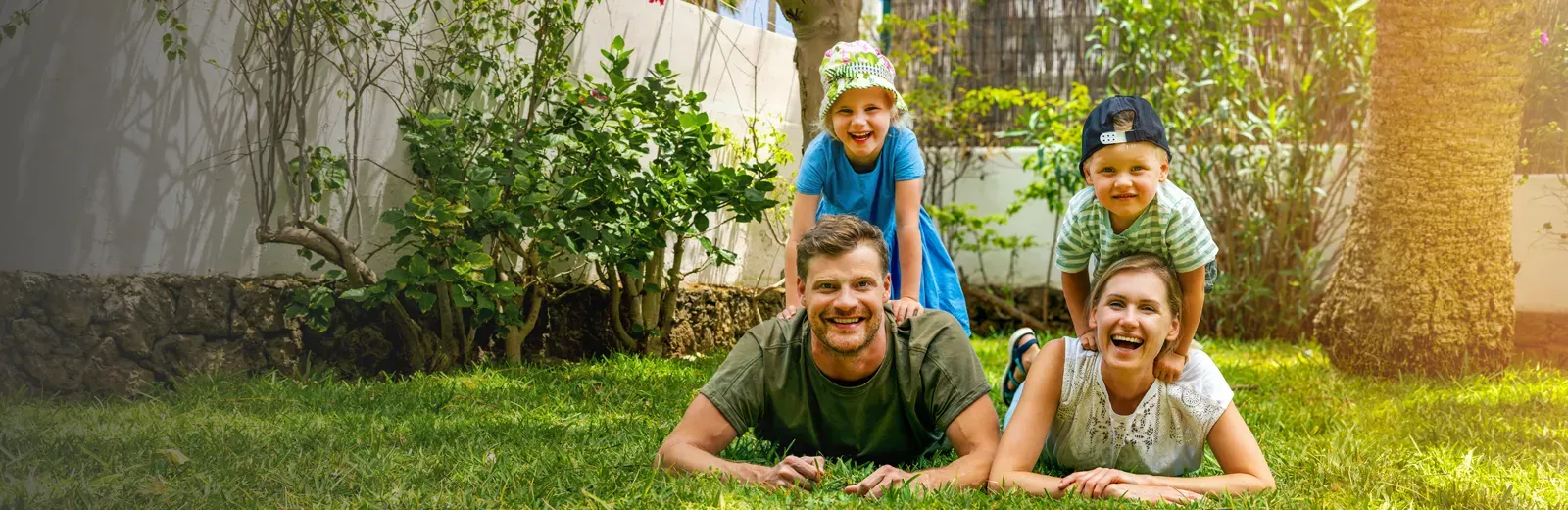 family laughing outside 